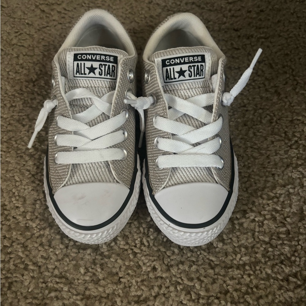 Brand new never worn kids Converse. Gorgeous pearly silver.